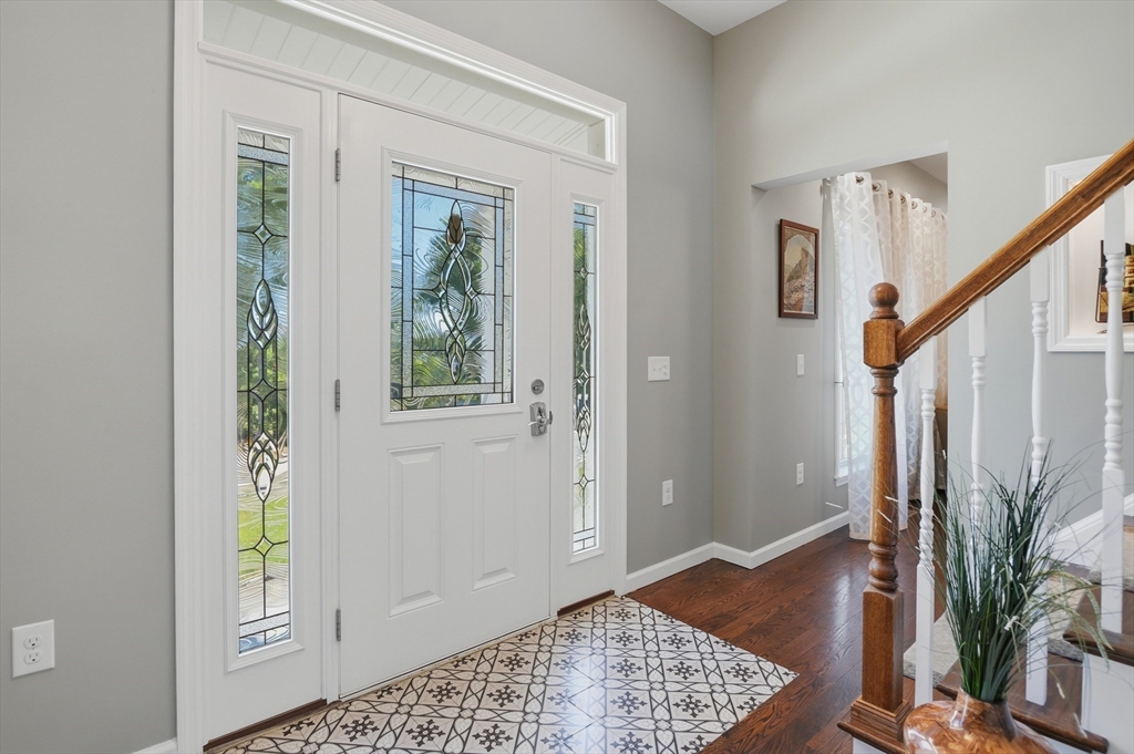 112 Pineland Avenue Worcester, MA 01604 - Photo 4 of 38 a view of entryway with wooden floor and a rug