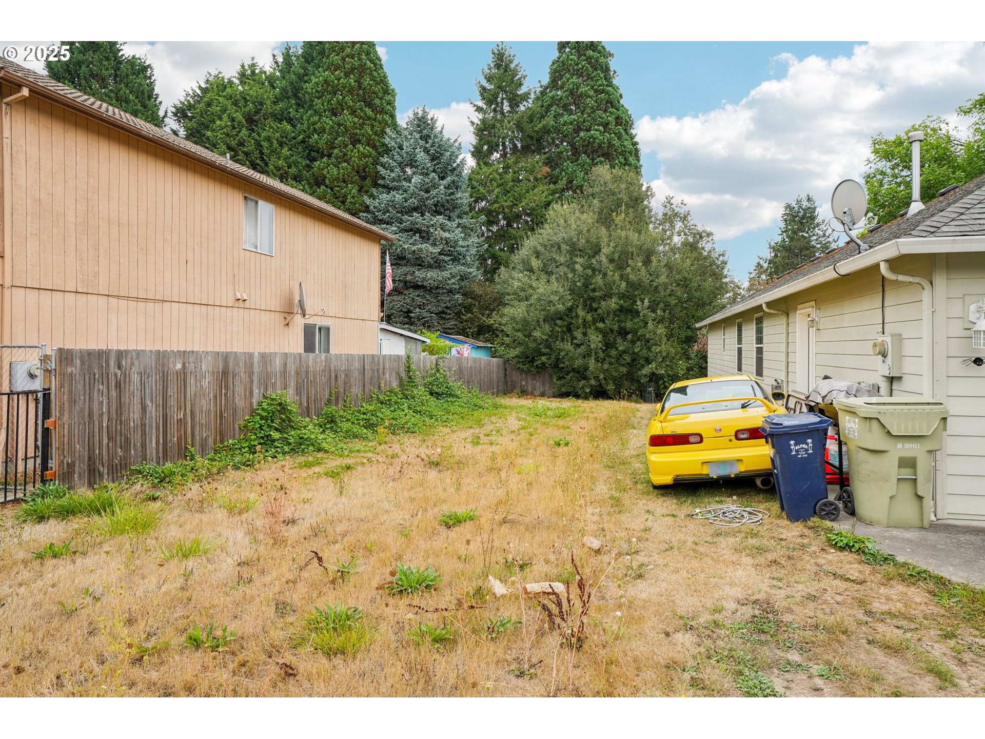 2986 Southwest 176th Avenue Beaverton, OR 97003 - Photo 6 of 21 a view of a backyard with table and chairs