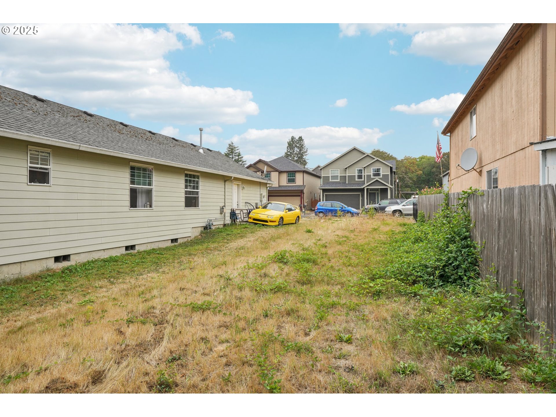 2986 Southwest 176th Avenue Beaverton, OR 97003 - Photo 7 of 21 a view of a house with a yard and sitting area