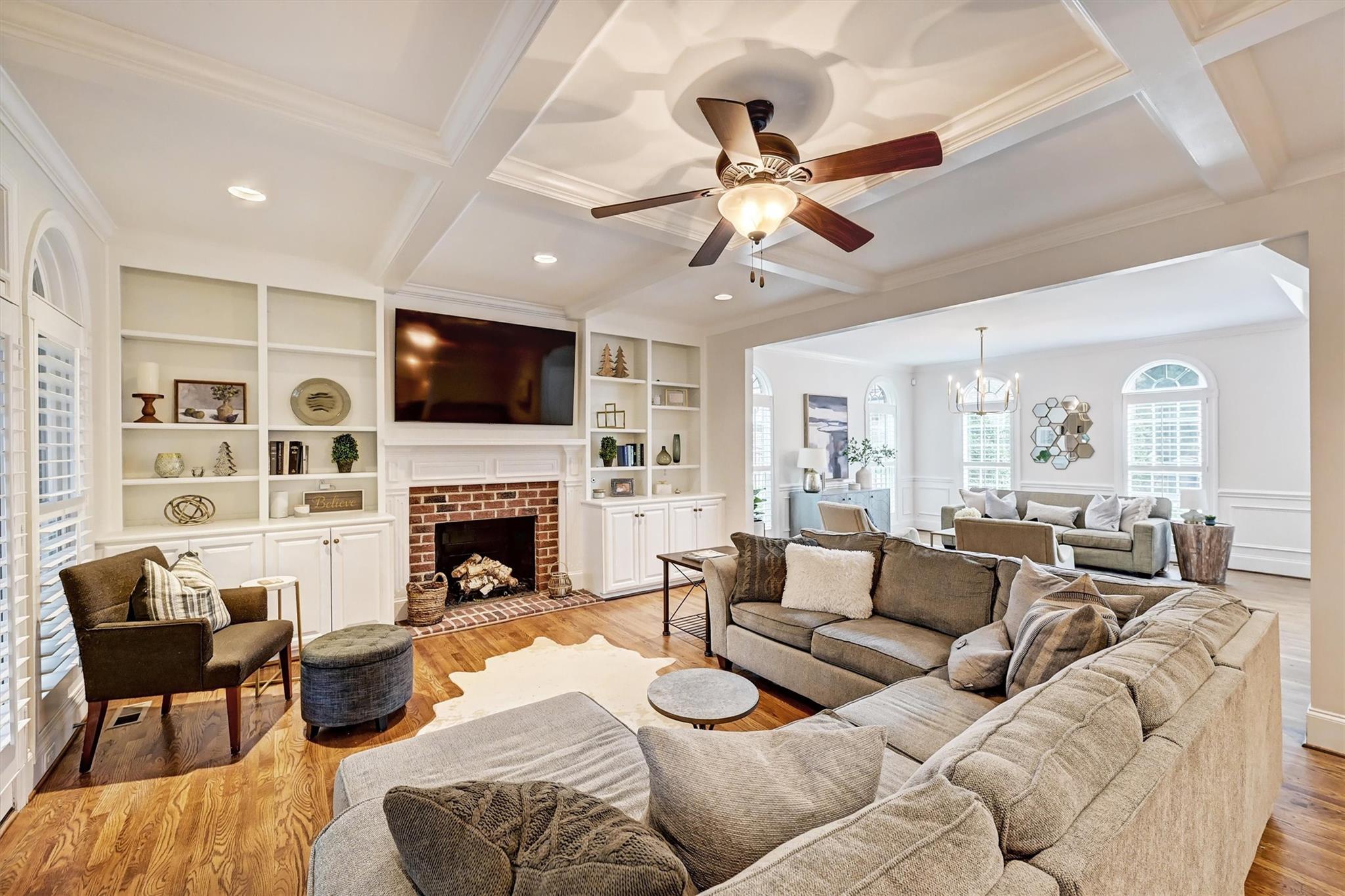 6009 Sharon View Road Charlotte, NC 28226 - Photo 12 of 47 a living room with furniture a fireplace and a flat screen tv