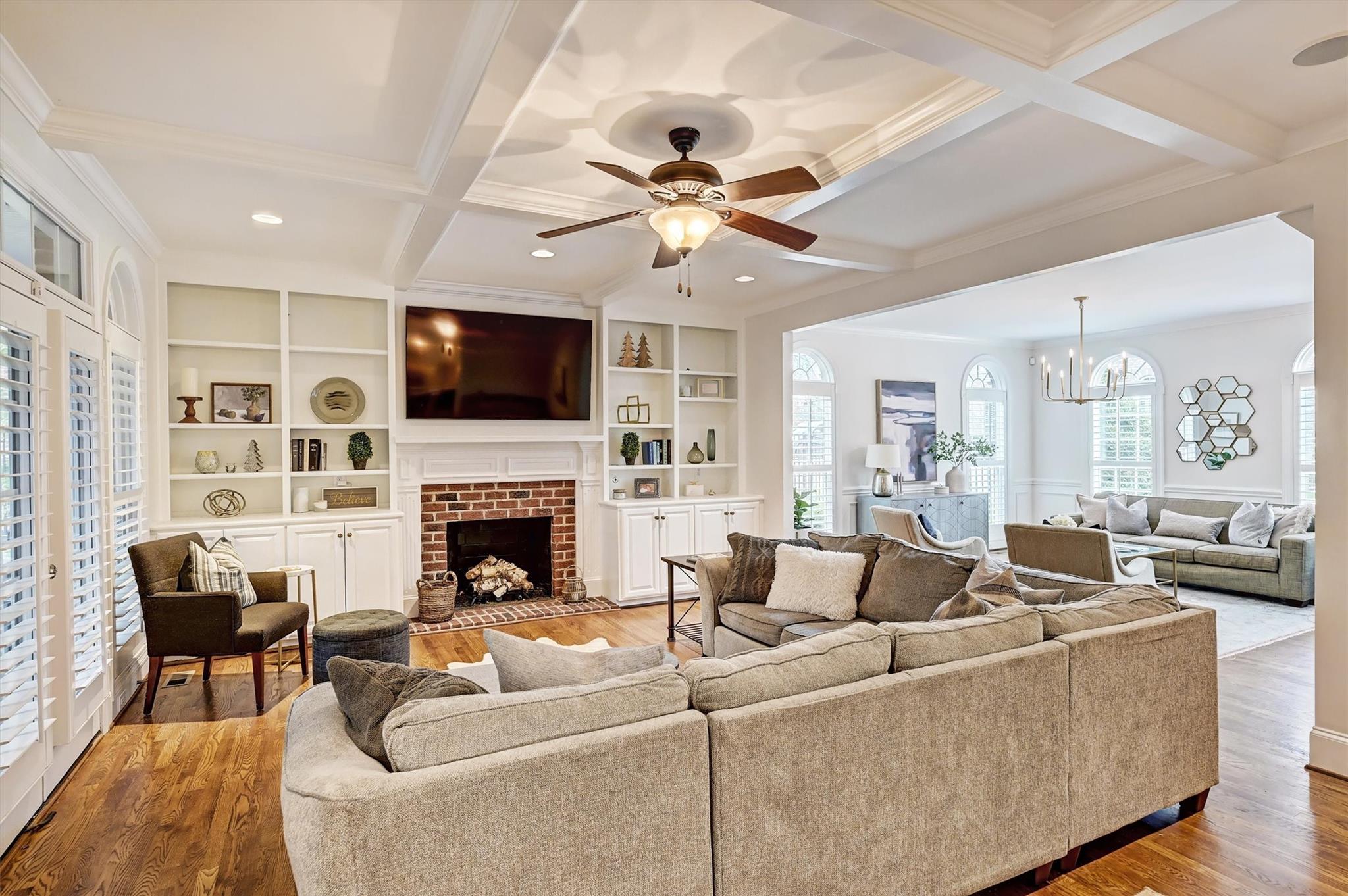 6009 Sharon View Road Charlotte, NC 28226 - Photo 13 of 47 a living room with furniture a fireplace and a flat screen tv