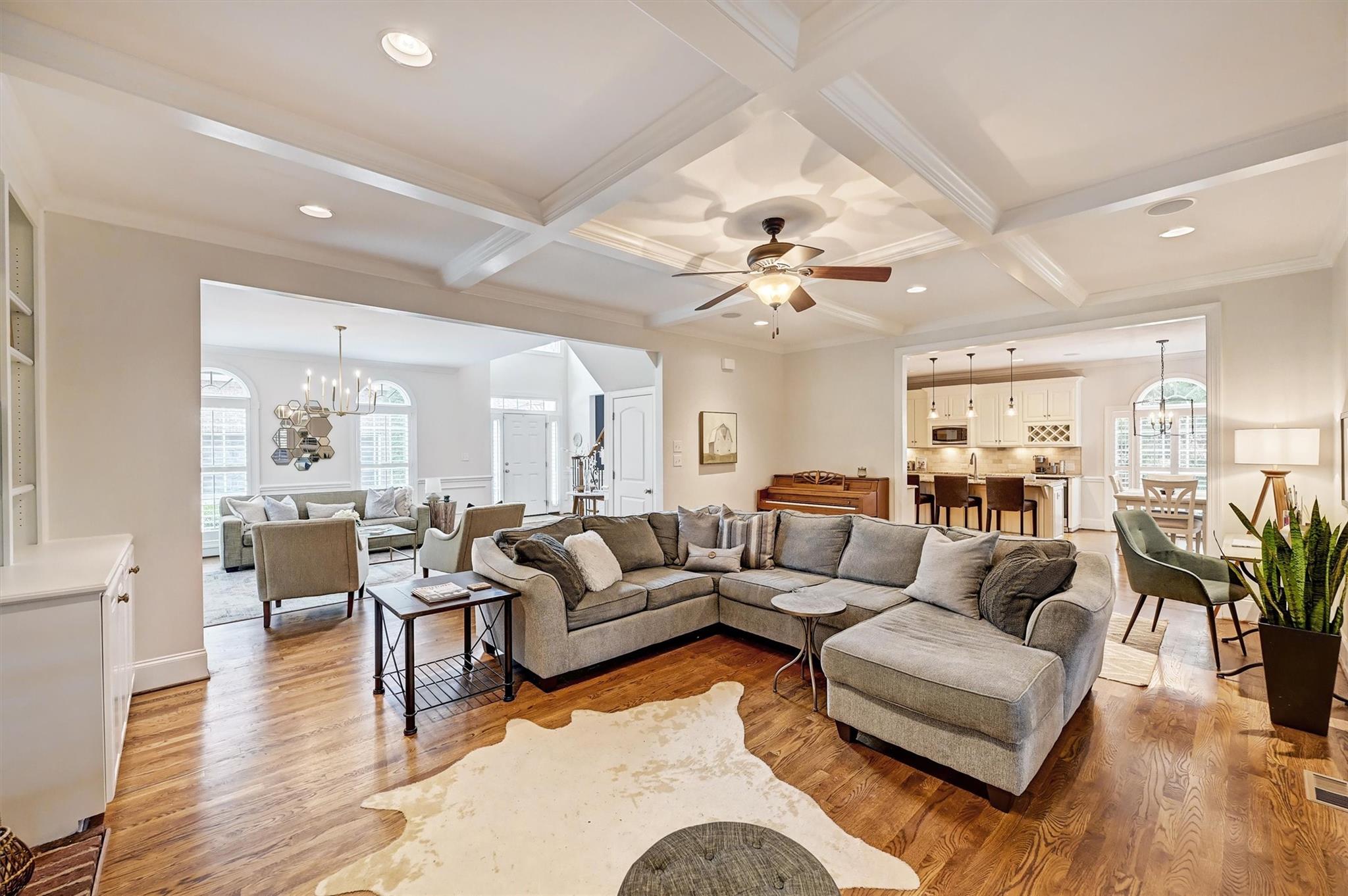 6009 Sharon View Road Charlotte, NC 28226 - Photo 14 of 47 a living room with furniture kitchen view and a wooden floor