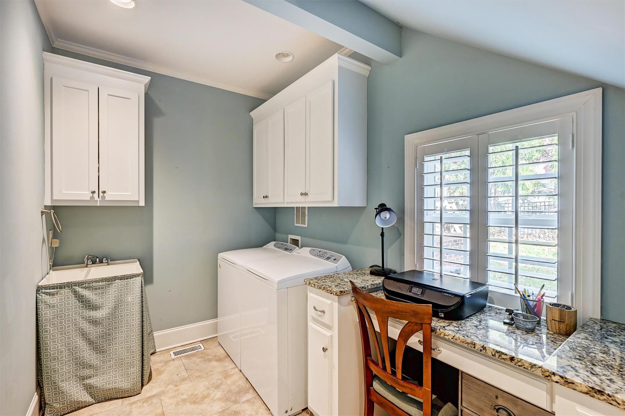 6009 Sharon View Road Charlotte, NC 28226 - Photo 23 of 47 a view of a storage and utility room with a window
