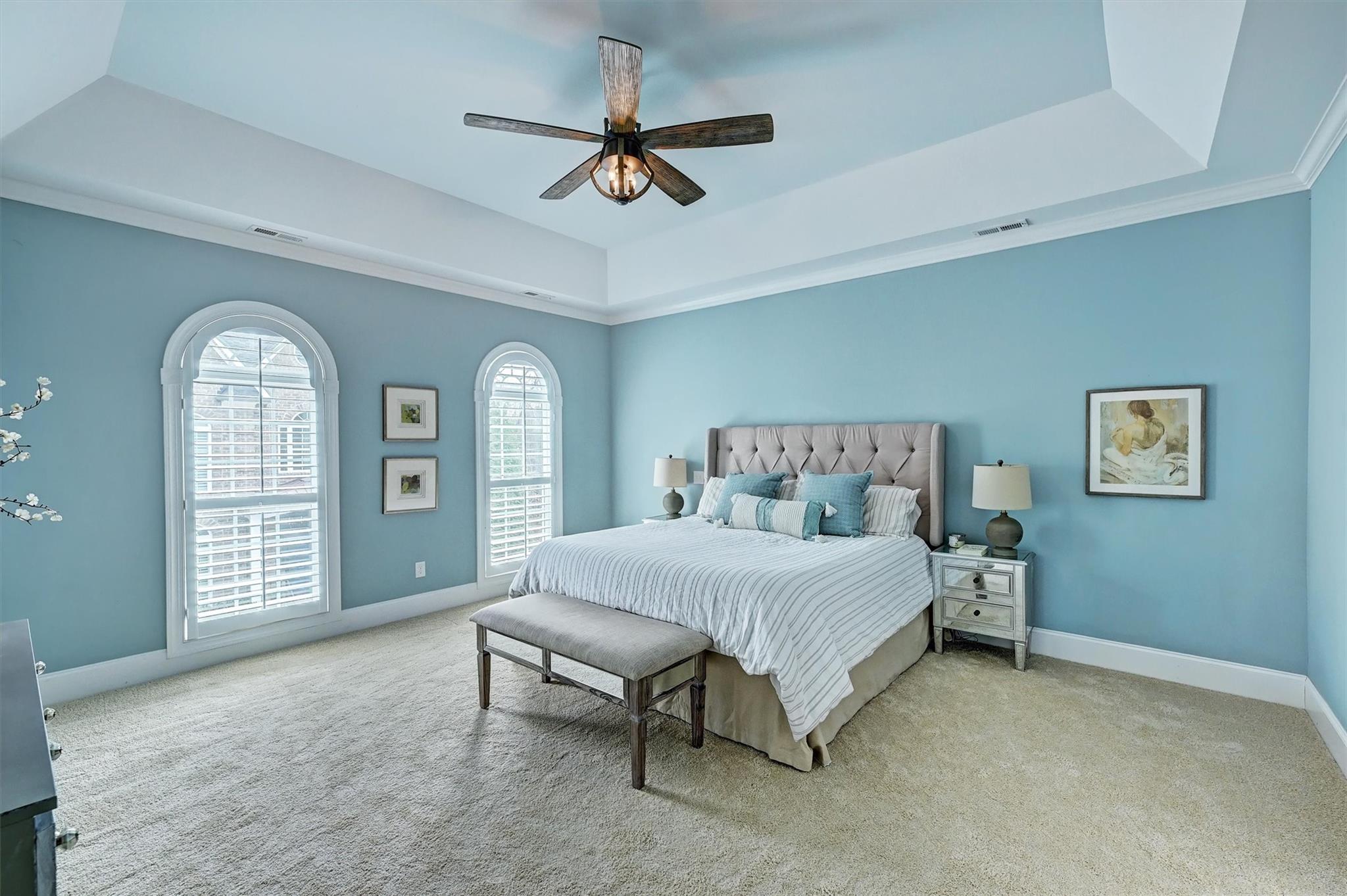 6009 Sharon View Road Charlotte, NC 28226 - Photo 27 of 47 a spacious bedroom with a bed and a dresser