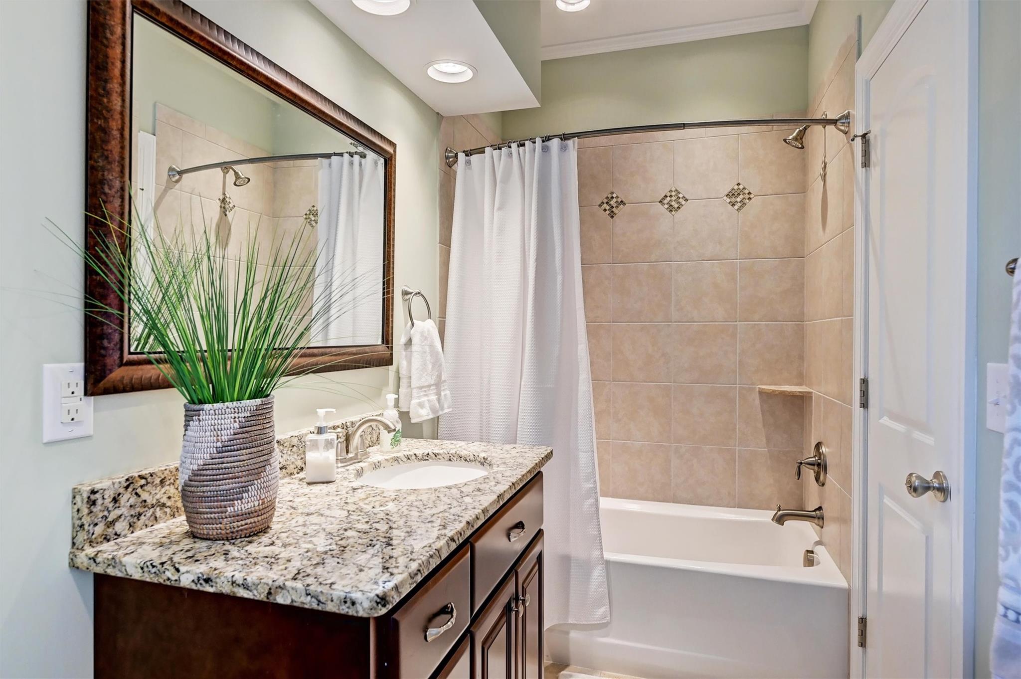 6009 Sharon View Road Charlotte, NC 28226 - Photo 35 of 47 a bathroom with a granite countertop sink and a mirror
