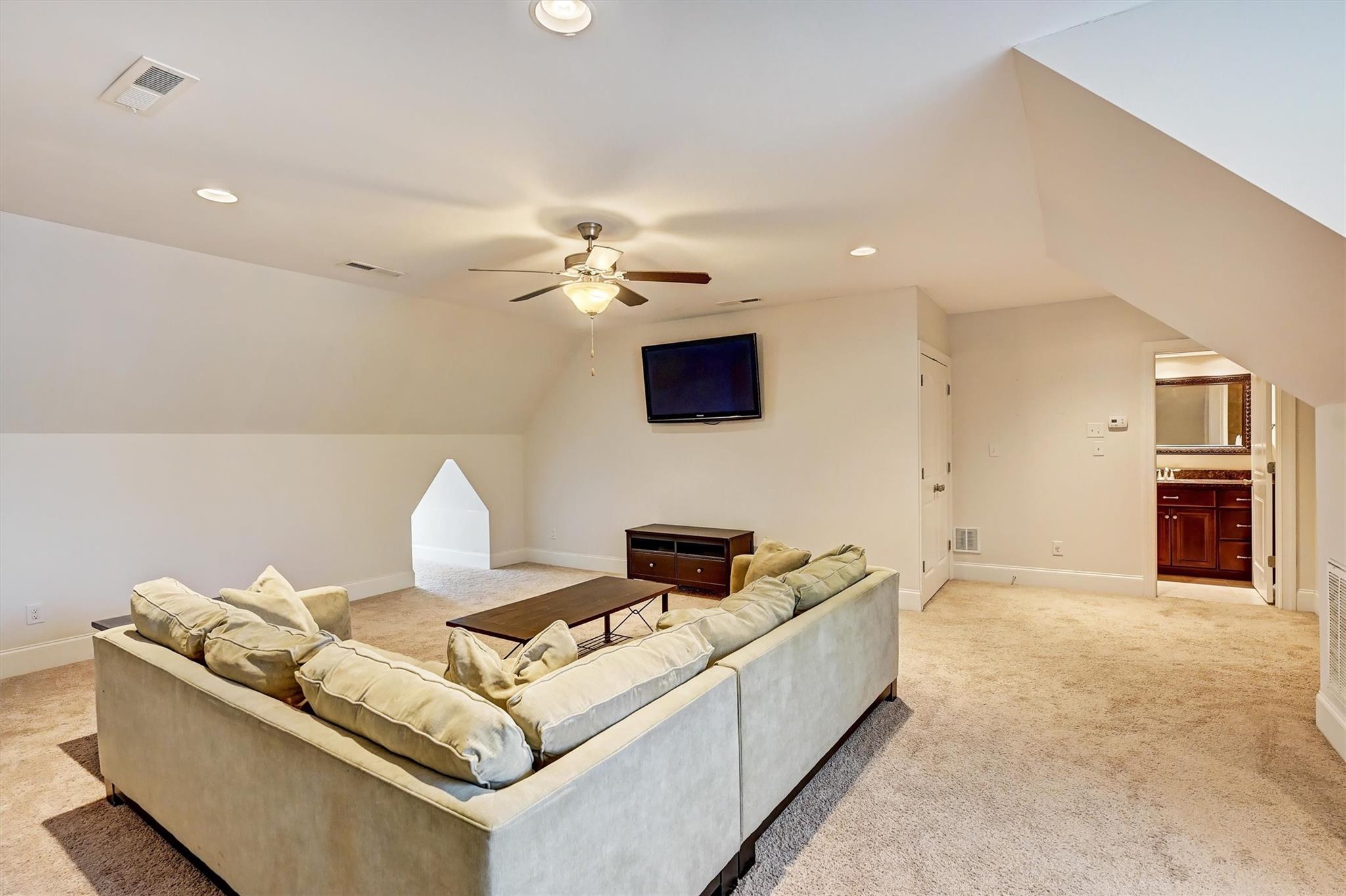 6009 Sharon View Road Charlotte, NC 28226 - Photo 38 of 47 a living room with furniture and a flat screen tv