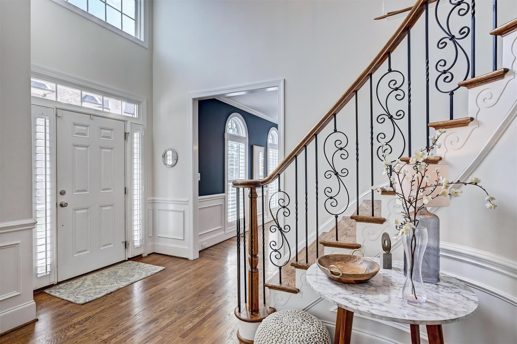 6009 Sharon View Road Charlotte, NC 28226 - Photo 4 of 47 a view of entryway dining room and hall with wooden floor
