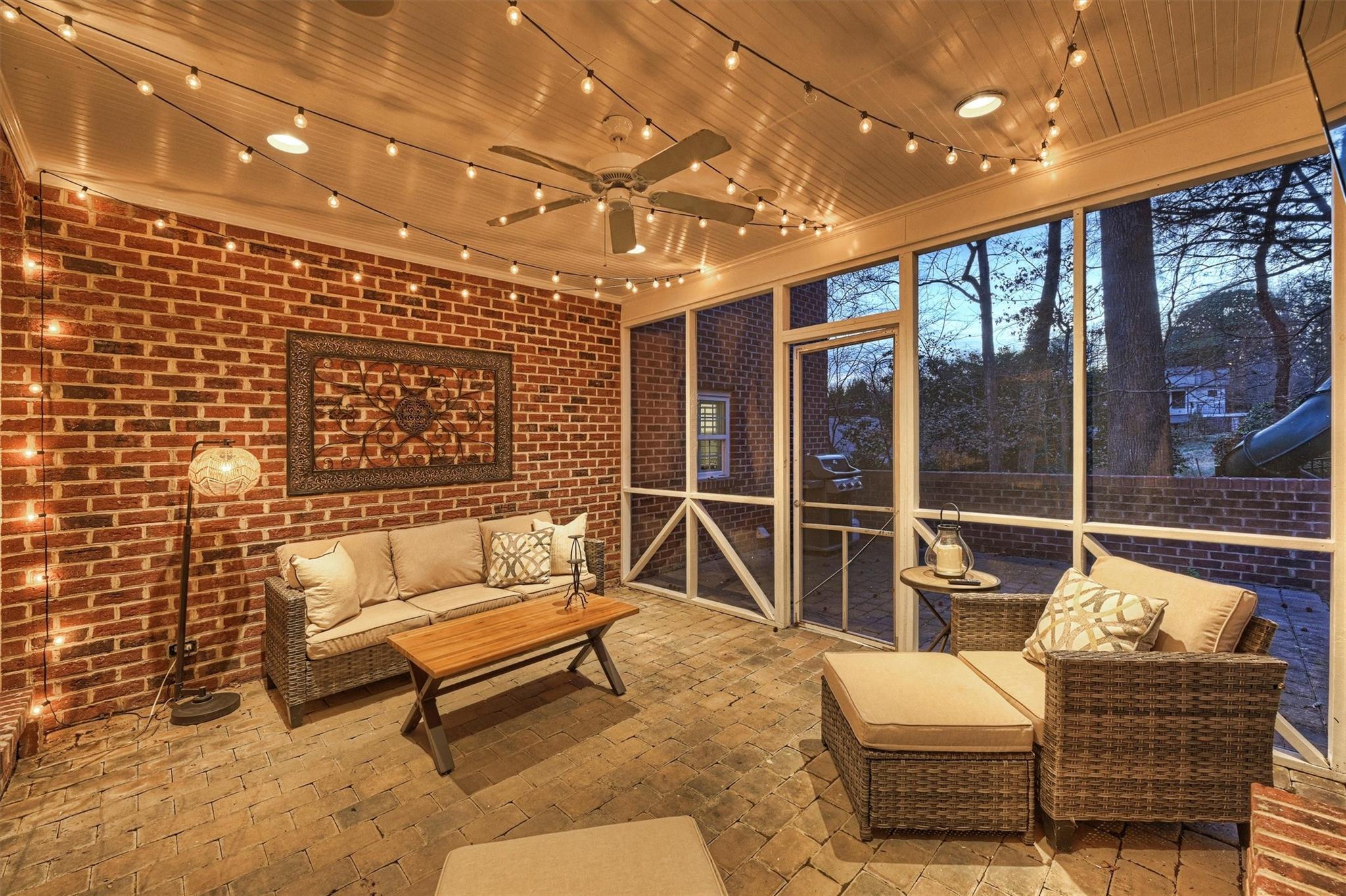 6009 Sharon View Road Charlotte, NC 28226 - Photo 41 of 47 a balcony with couple of chairs and a potted plant