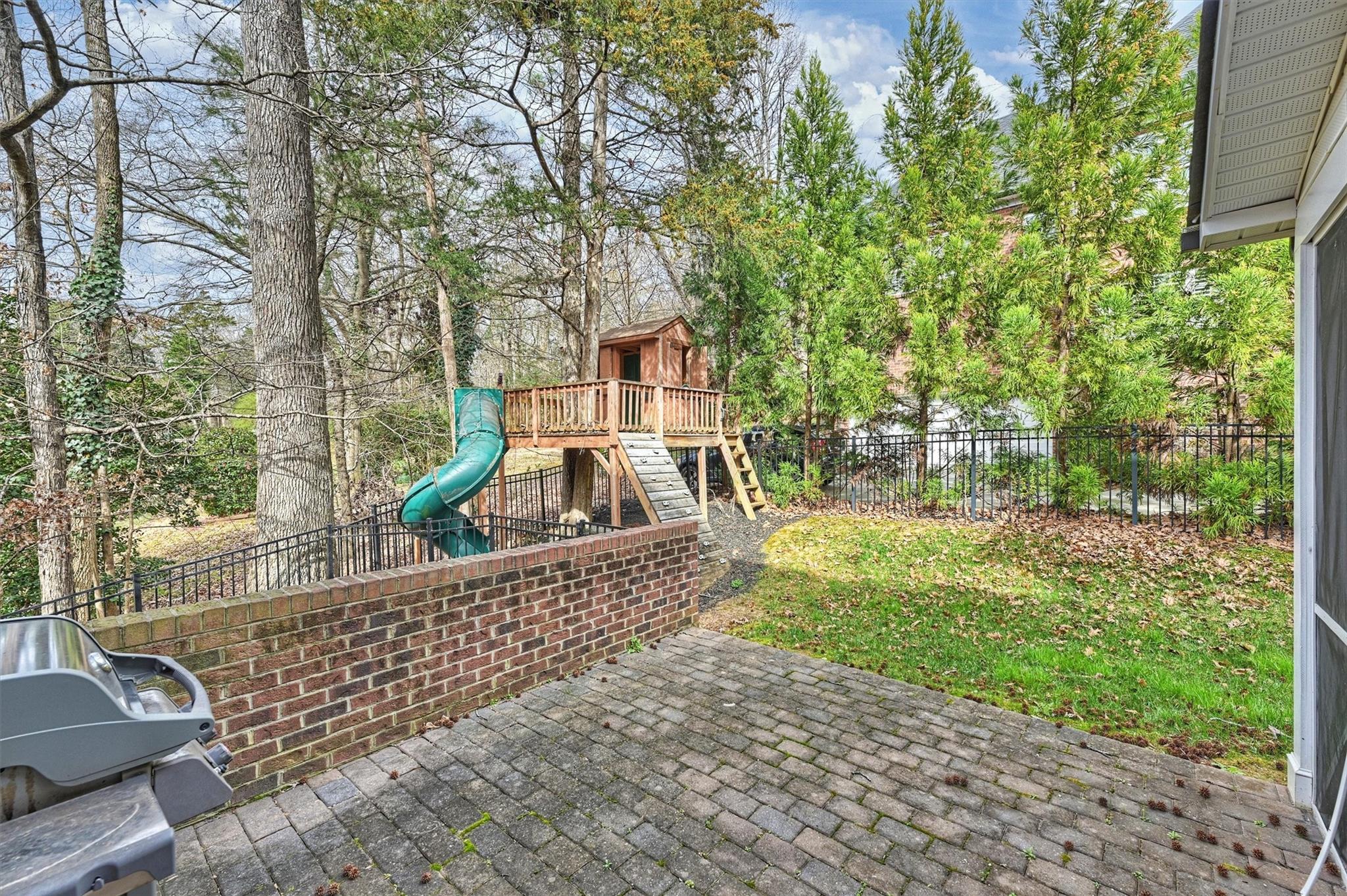 6009 Sharon View Road Charlotte, NC 28226 - Photo 43 of 47 a view of a house with a yard