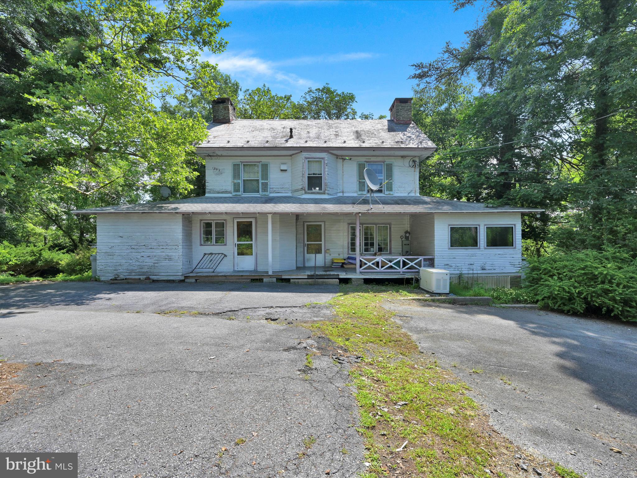 21 Blue Rocks Road Lenhartsville, PA 19534 - Photo 2 of 48 front view of a house with a yard