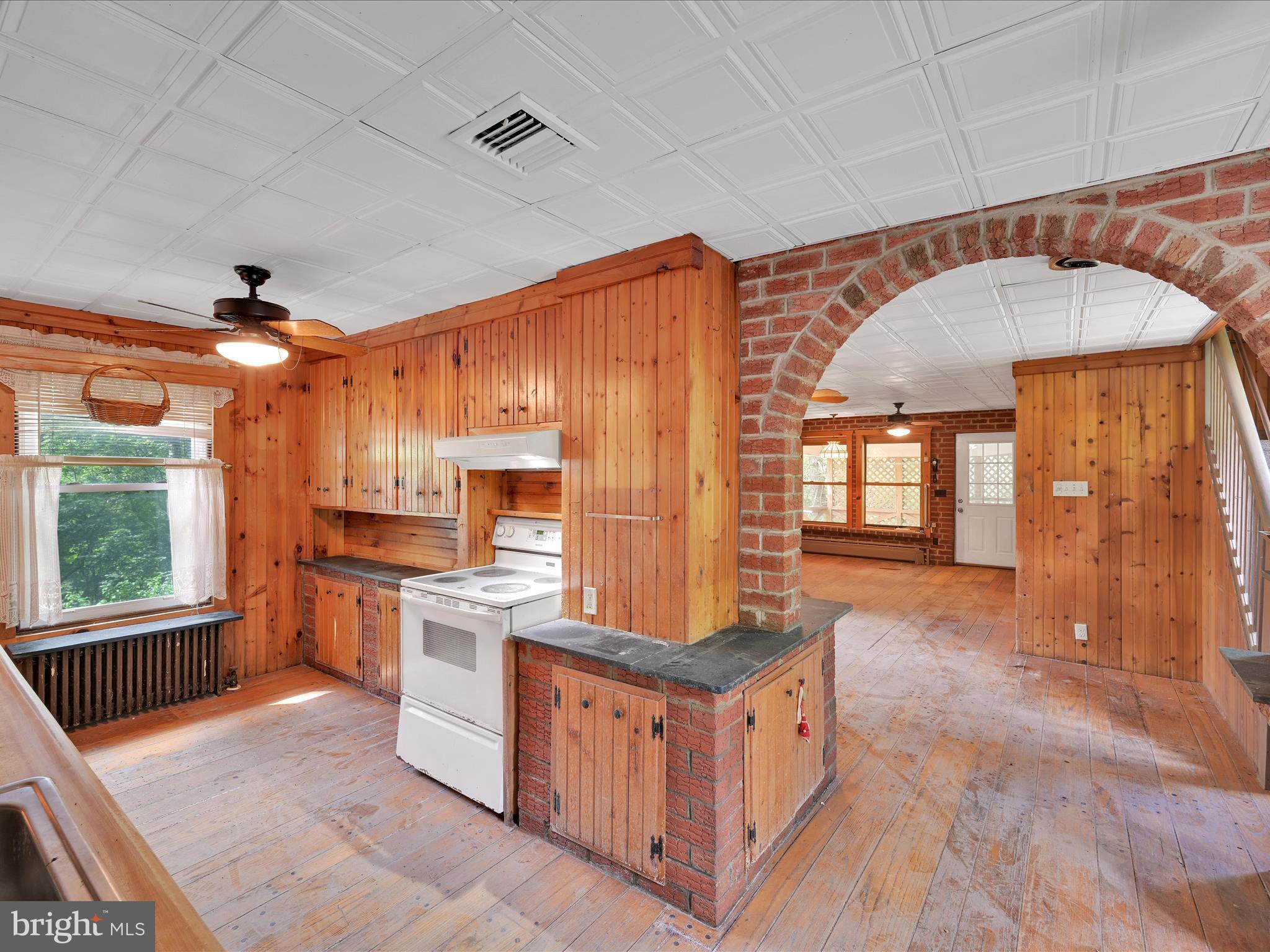 21 Blue Rocks Road Lenhartsville, PA 19534 - Photo 22 of 48 a kitchen with stainless steel appliances granite countertop a stove a sink dishwasher and a refrigerator