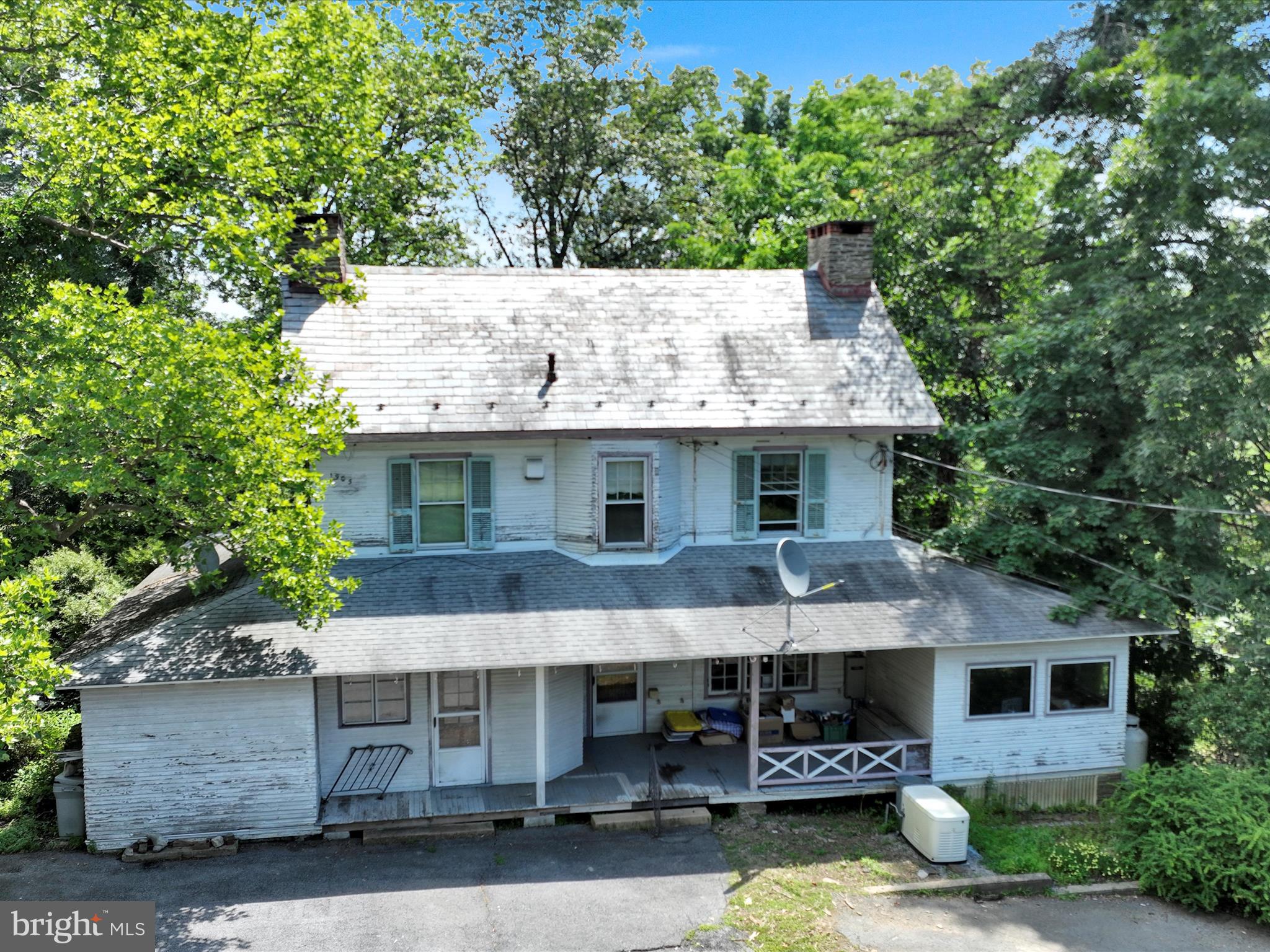 21 Blue Rocks Road Lenhartsville, PA 19534 - Photo 3 of 48 an aerial view of a house with swimming pool and large trees