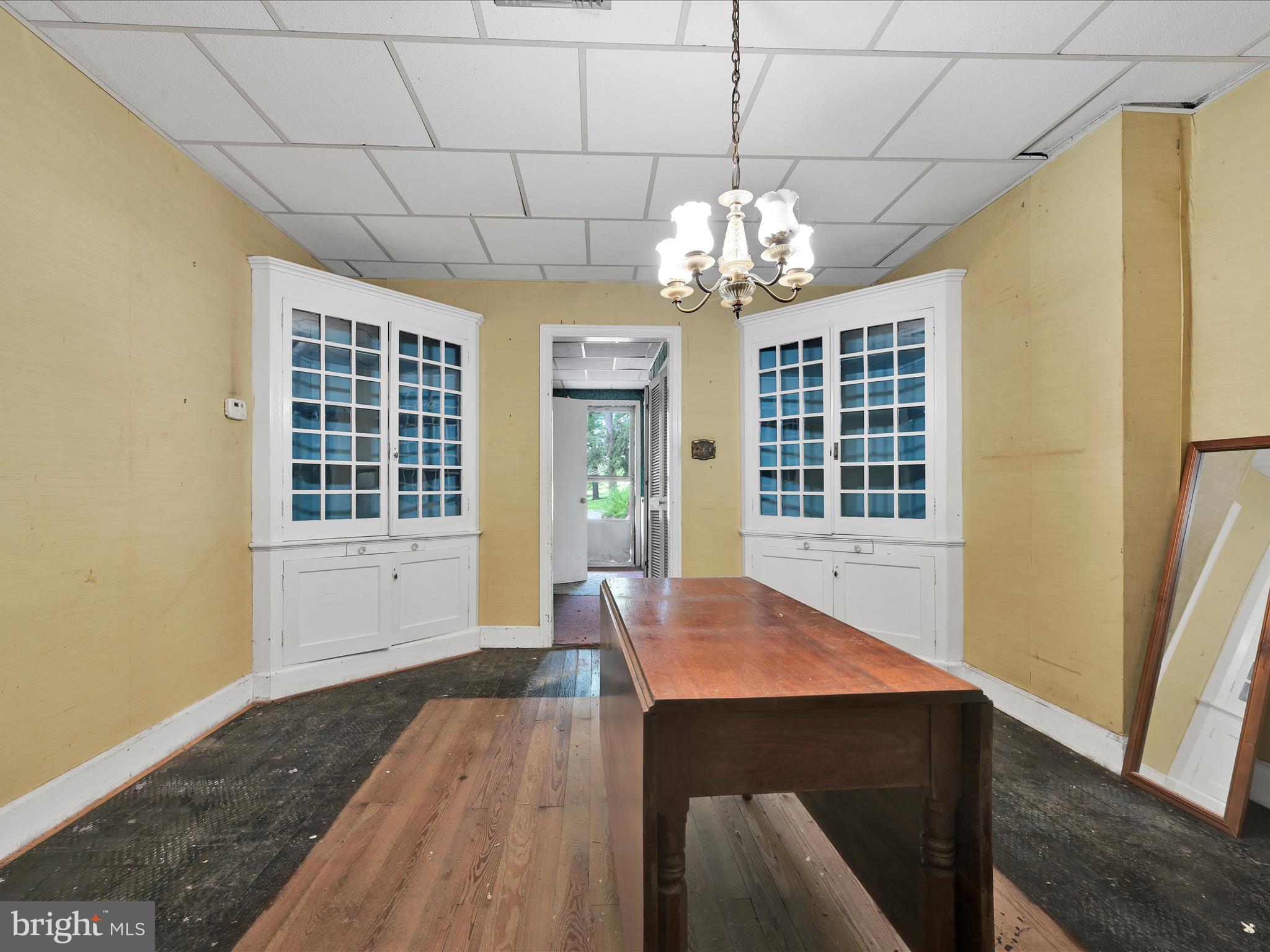 21 Blue Rocks Road Lenhartsville, PA 19534 - Photo 8 of 48 a view of a room with wooden floor and windows