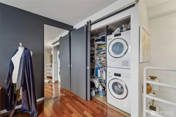 a view of a storage & utility room with washer and dryer