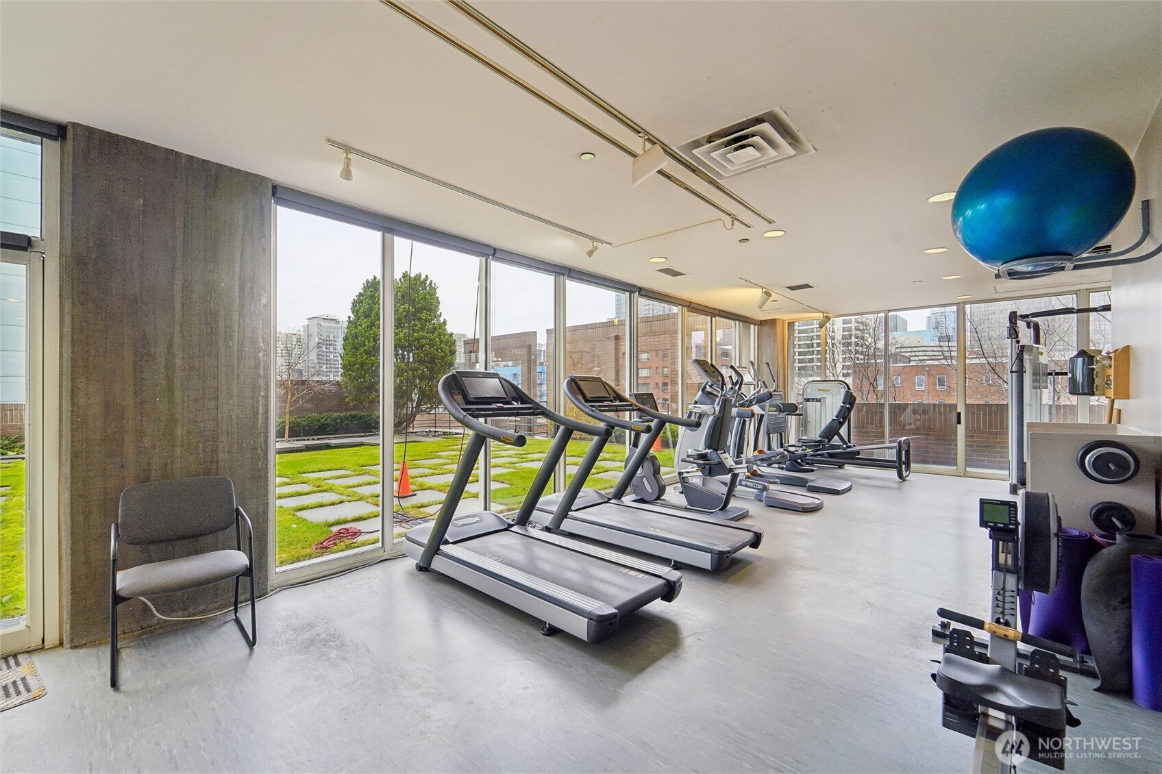 2125 1st Avenue, Unit 1702 Seattle, WA 98121 - Photo 20 of 26 a view of a room with gym equipment
