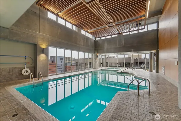 a view of a swimming pool with a porch