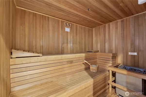 a view of a utility room with a wooden floor