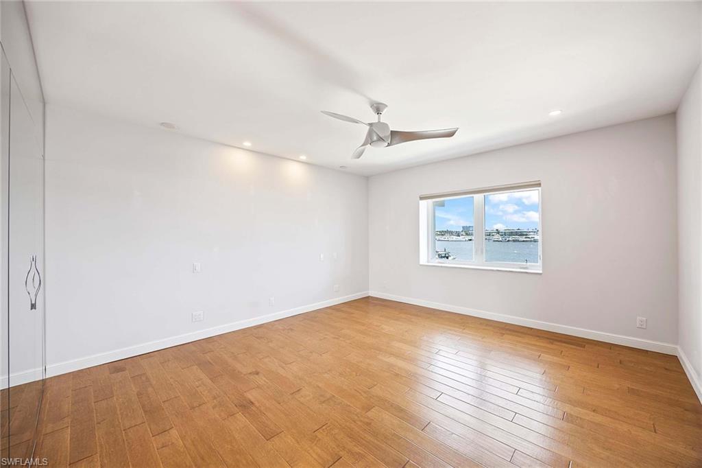1325 7th Street South, Unit 2B Naples, FL 34102 - Photo 14 of 34 a view of an empty room with a window