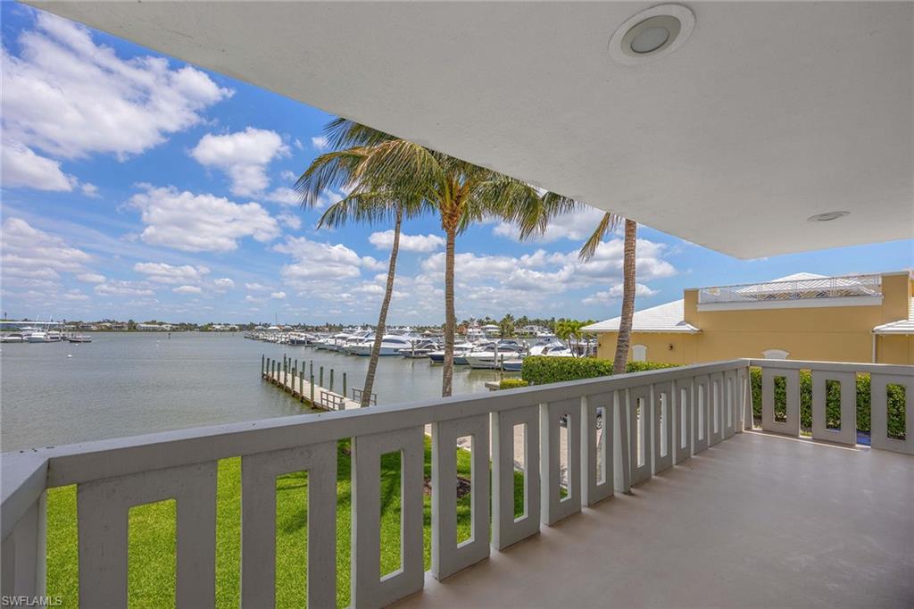 1325 7th Street South, Unit 2B Naples, FL 34102 - Photo 26 of 34 a view of a city skyline from a balcony