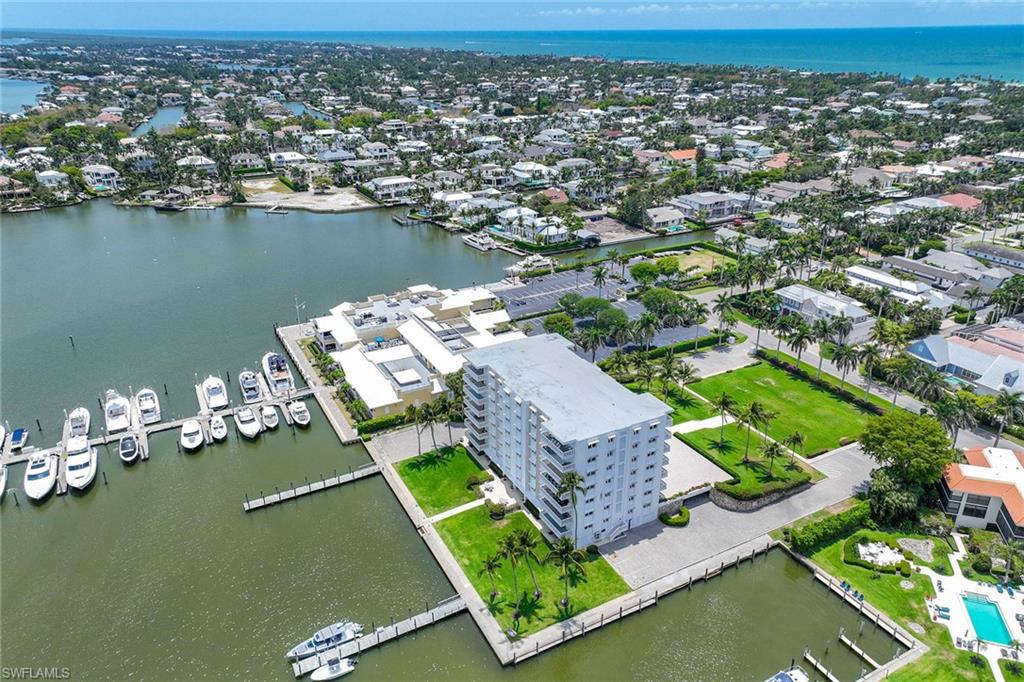 1325 7th Street South, Unit 2B Naples, FL 34102 - Photo 27 of 34 an aerial view of a house with a lake view