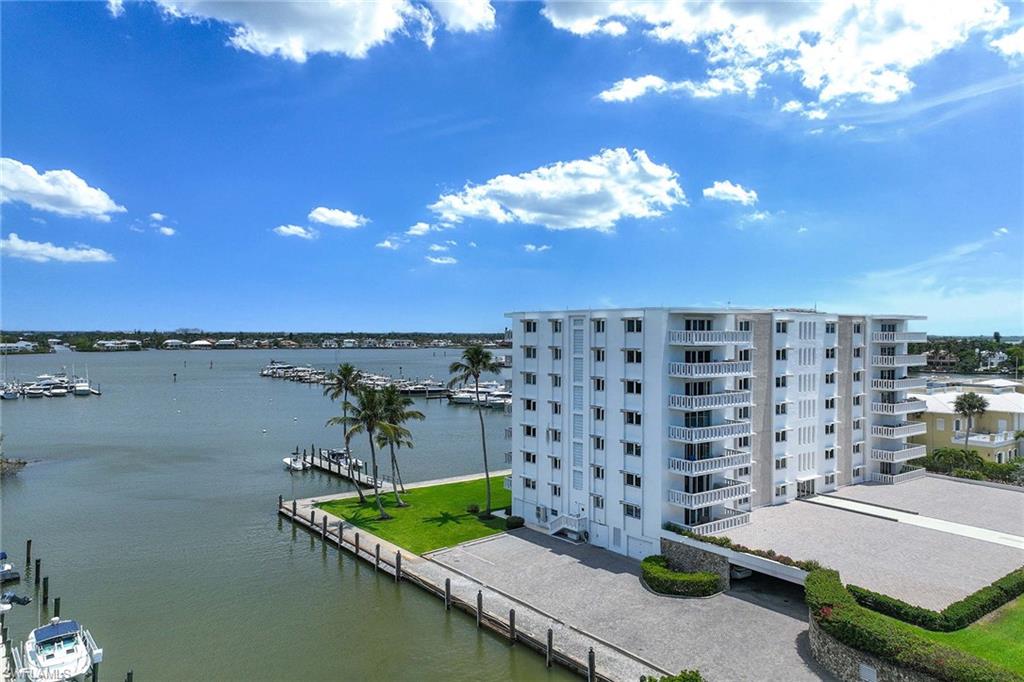 1325 7th Street South, Unit 2B Naples, FL 34102 - Photo 28 of 34 a view of a terrace with a lake view