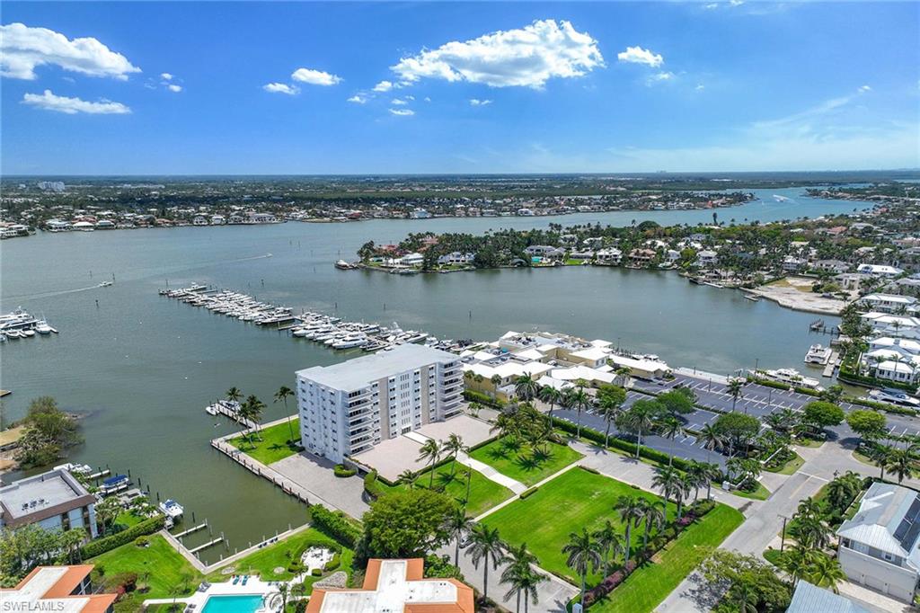 1325 7th Street South, Unit 2B Naples, FL 34102 - Photo 3 of 34 an aerial view of a house with a lake view