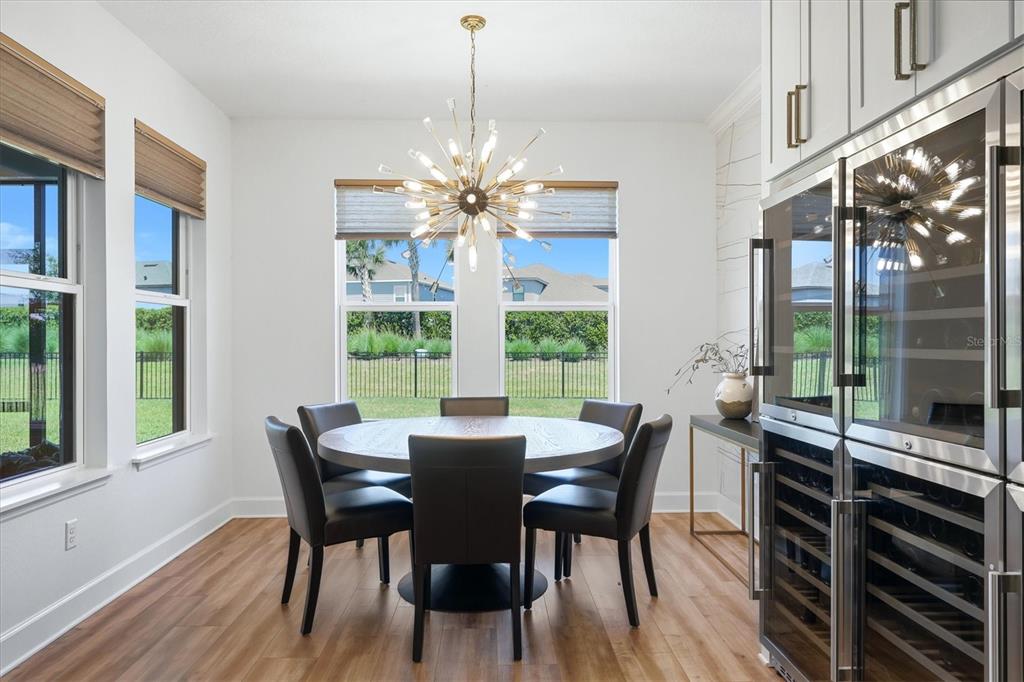 8498 Snowfall Street Sarasota, FL 34241 - Photo 25 of 95 a view of a dining room with furniture window and outside view