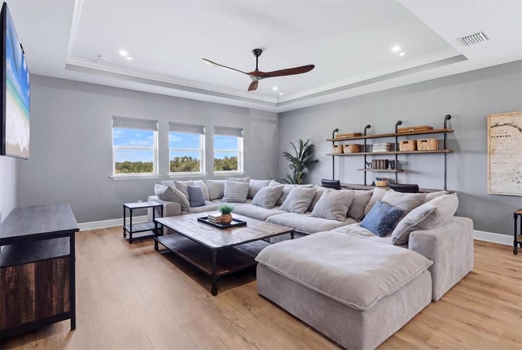 8498 Snowfall Street Sarasota, FL 34241 - Photo 43 of 95 a living room with furniture and a window