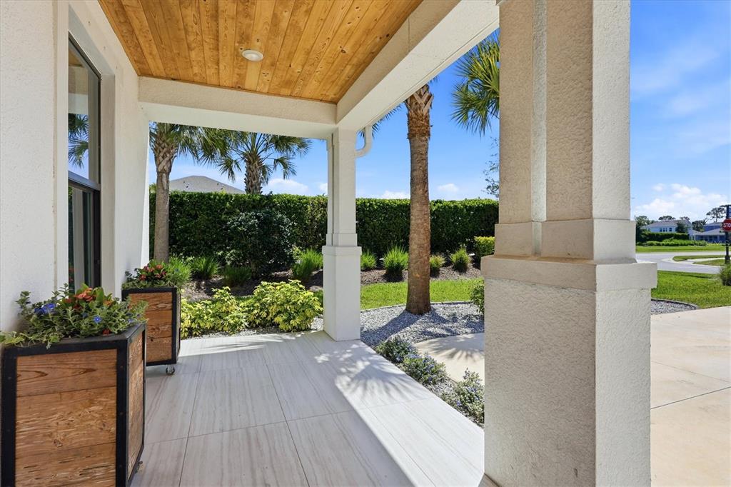 8498 Snowfall Street Sarasota, FL 34241 - Photo 5 of 95 a house view with a garden space