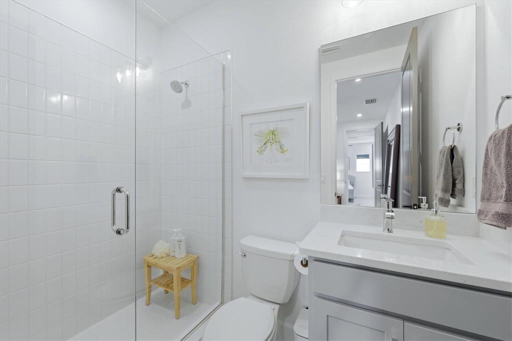 8498 Snowfall Street Sarasota, FL 34241 - Photo 53 of 95 a bathroom with a sink toilet and shower
