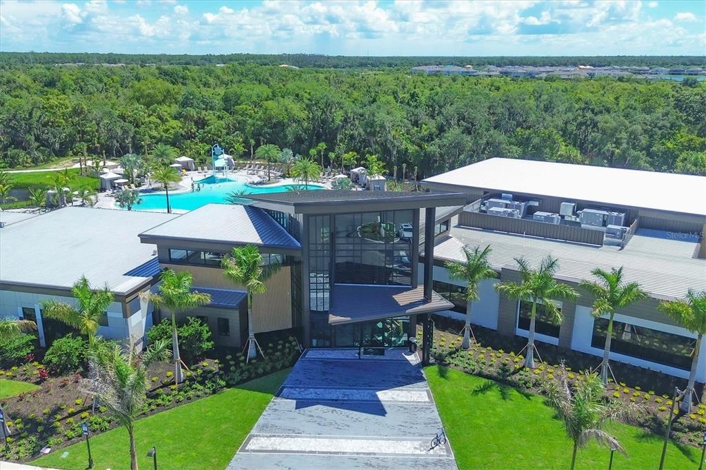 8498 Snowfall Street Sarasota, FL 34241 - Photo 67 of 95 an aerial view of a house with garden space and sitting area