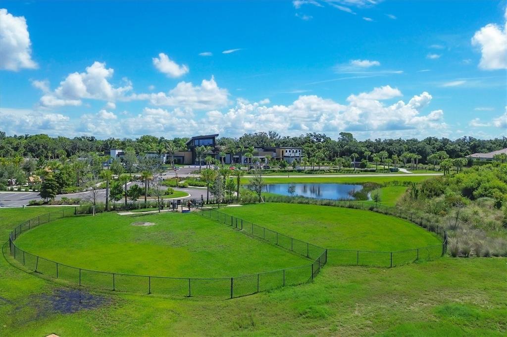 8498 Snowfall Street Sarasota, FL 34241 - Photo 91 of 95 a view of a golf course with a lake view