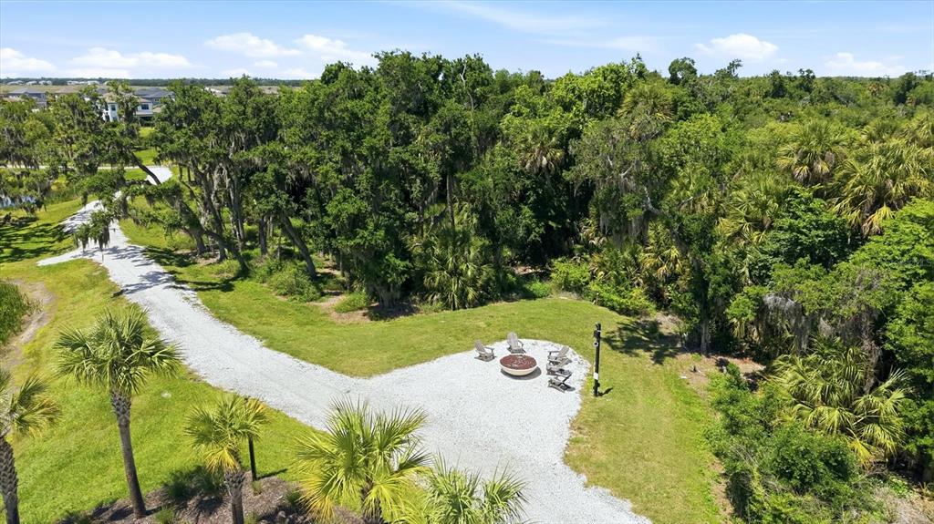 8498 Snowfall Street Sarasota, FL 34241 - Photo 94 of 95 a view of a lake with a yard
