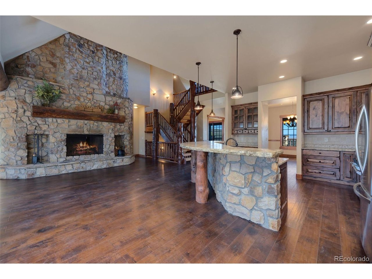5200 Jackson Road Walden, CO 80480 - Photo 7 of 40 Large stone center island high-top breakfast bar with in floor heating
