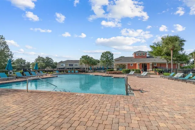 a view of a lake with sitting area