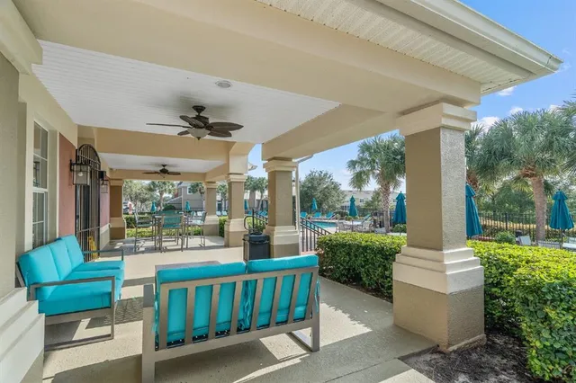 a front view of a house with a garden and patio