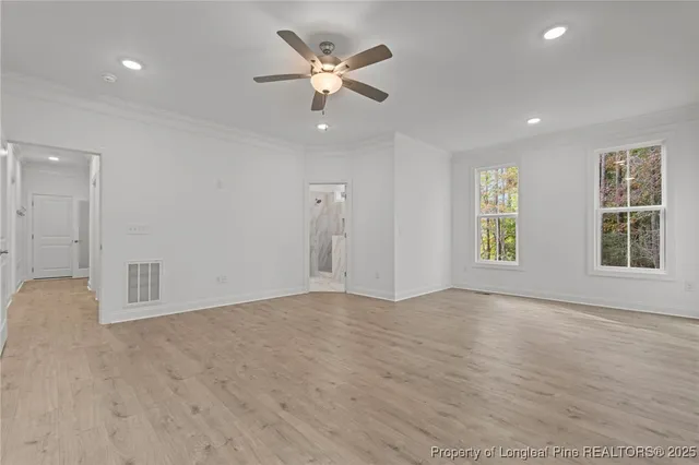 a view of an empty walk in closet