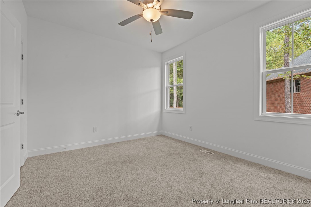 45 Pine Hill Court Spring Lake, NC 28390 - Photo 6 of 40 a view of an empty room with a window