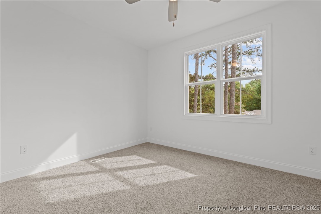 45 Pine Hill Court Spring Lake, NC 28390 - Photo 8 of 40 an empty room with a window
