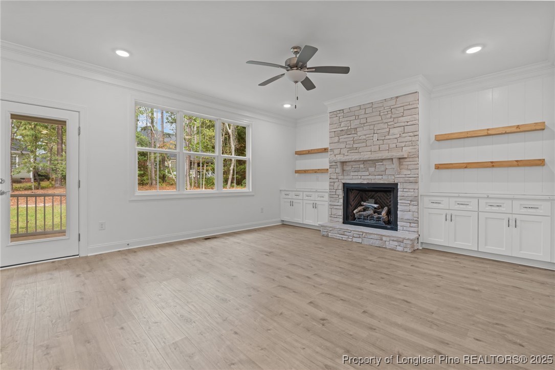 45 Pine Hill Court Spring Lake, NC 28390 - Photo 9 of 40 an empty room with windows and fireplace