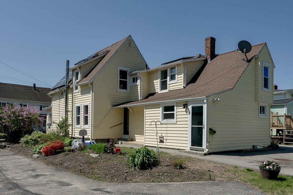 14 Sutton Avenue Oxford, MA 01540 - Photo 23 of 29 a front view of a house with a yard