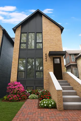 a front view of house with an outdoor space