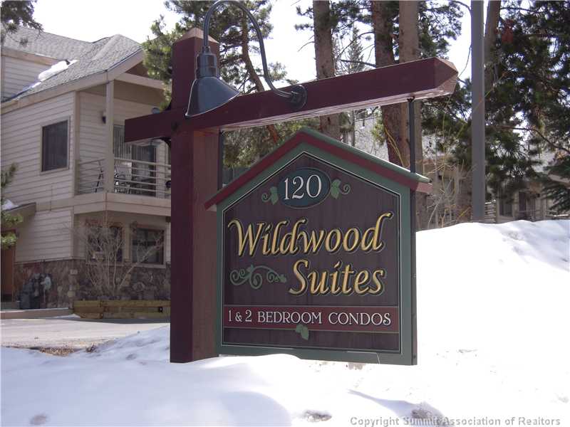 120 Sawmill Road, Unit 313 Breckenridge, CO 80424 - Photo 17 of 18 Exterior Front. Make Wildwood your Mountain getaway! Complex was recently renovated with new siding/stone, roof and decks.