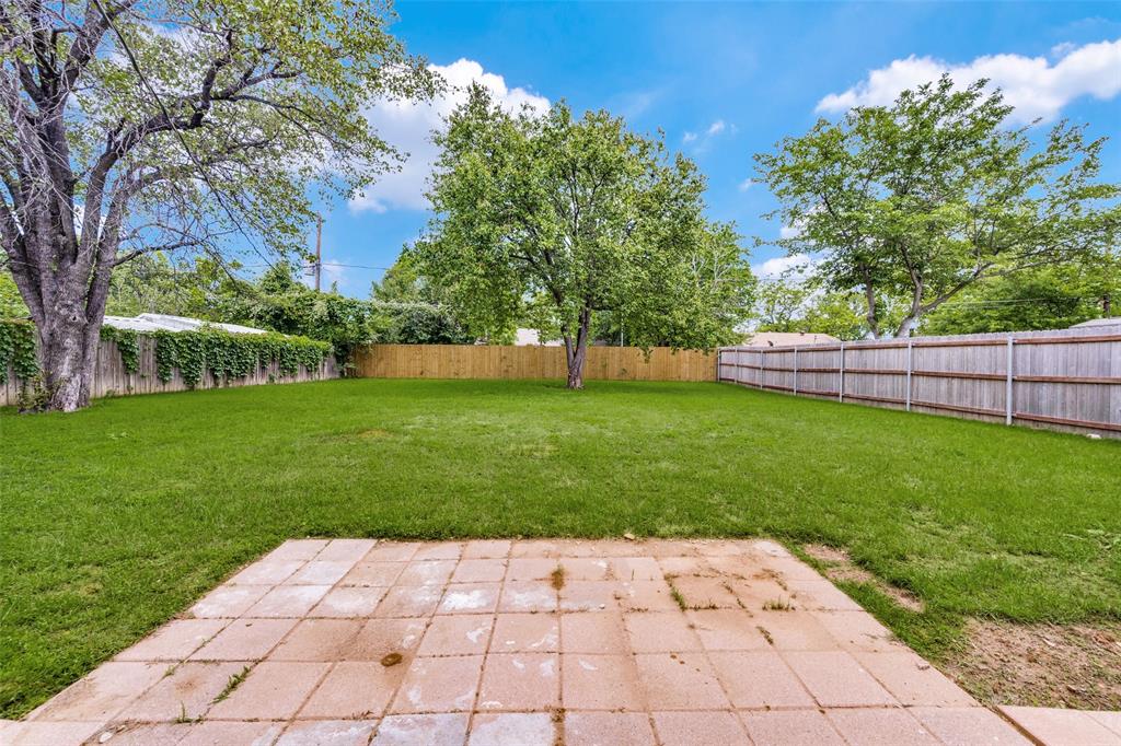 5901 Myers Road Arlington, TX 76017 - Photo 2 of 23 a view of a backyard with a garden