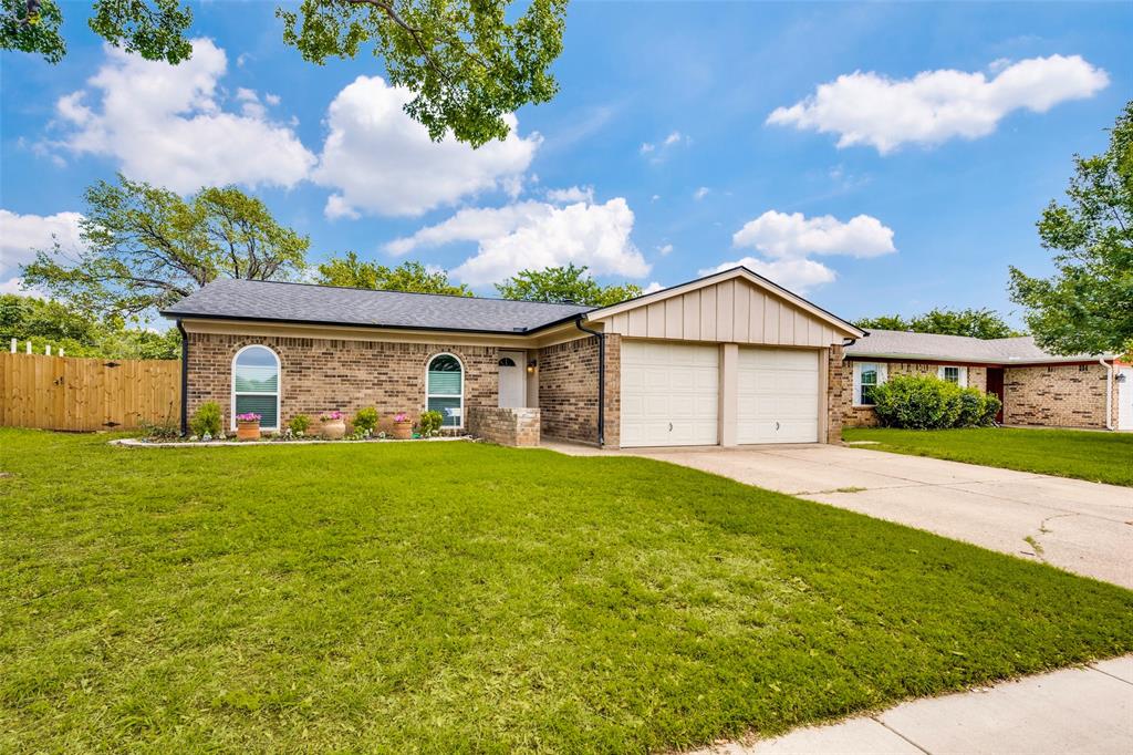 5901 Myers Road Arlington, TX 76017 - Photo 23 of 23 a front view of a house with a garden