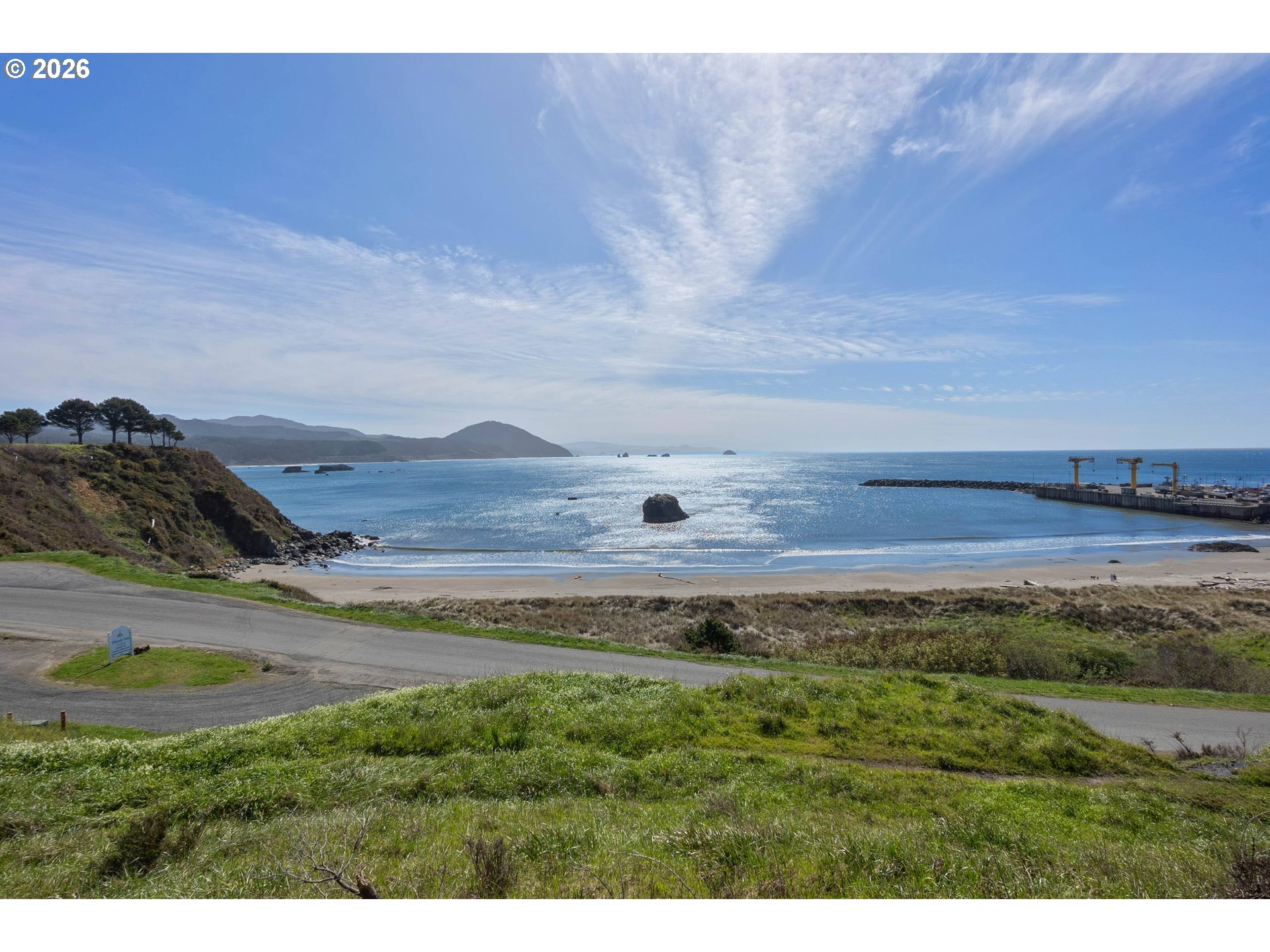 440 5th Street Port Orford, OR 97465 - Photo 3 of 8 a view of a field with an ocean