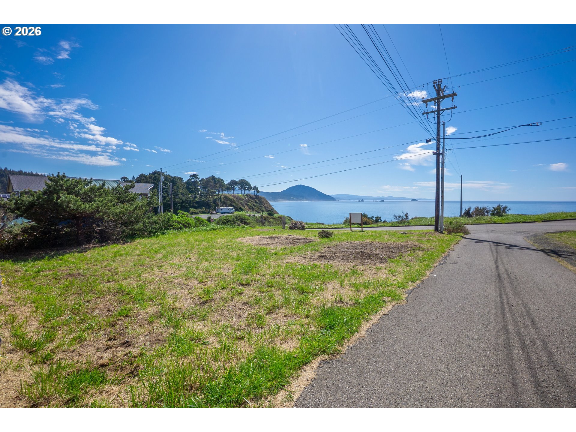 440 5th Street Port Orford, OR 97465 - Photo 7 of 8 a view of a terrace with a yard