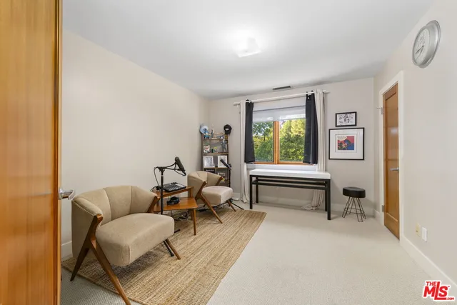 a view of a kitchen with cabinets