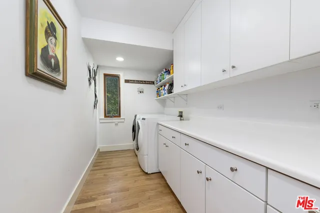 a view of a swimming pool with a yard