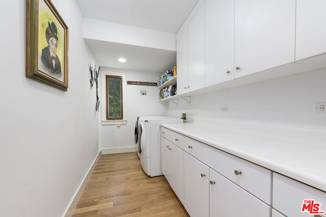 2601 Nichols Canyon Road Los Angeles, CA 90046 - Photo 18 of 28 a view of a kitchen with cabinets